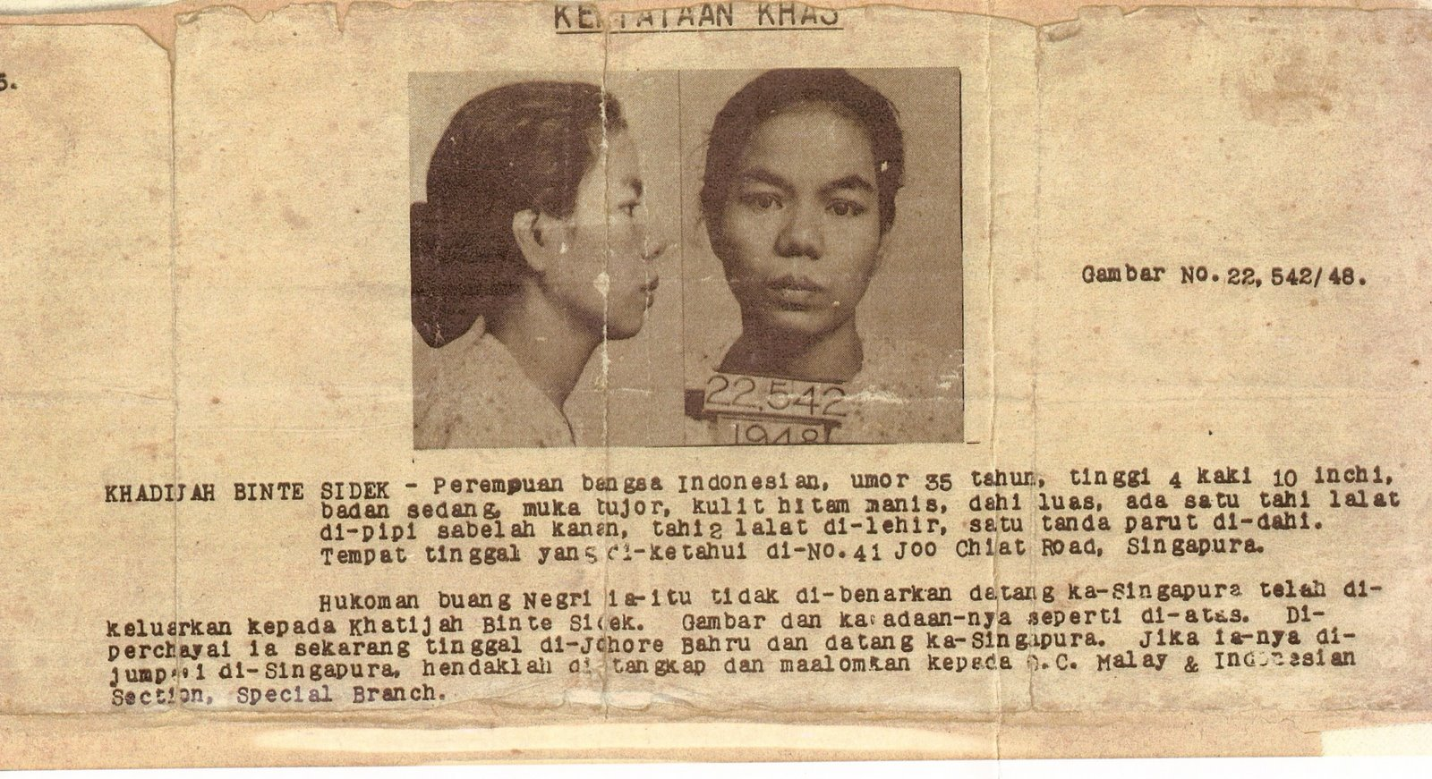 Photo of official documents with photo of woman and text.